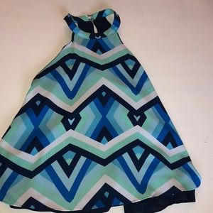 A ligneded blue and teal tank top